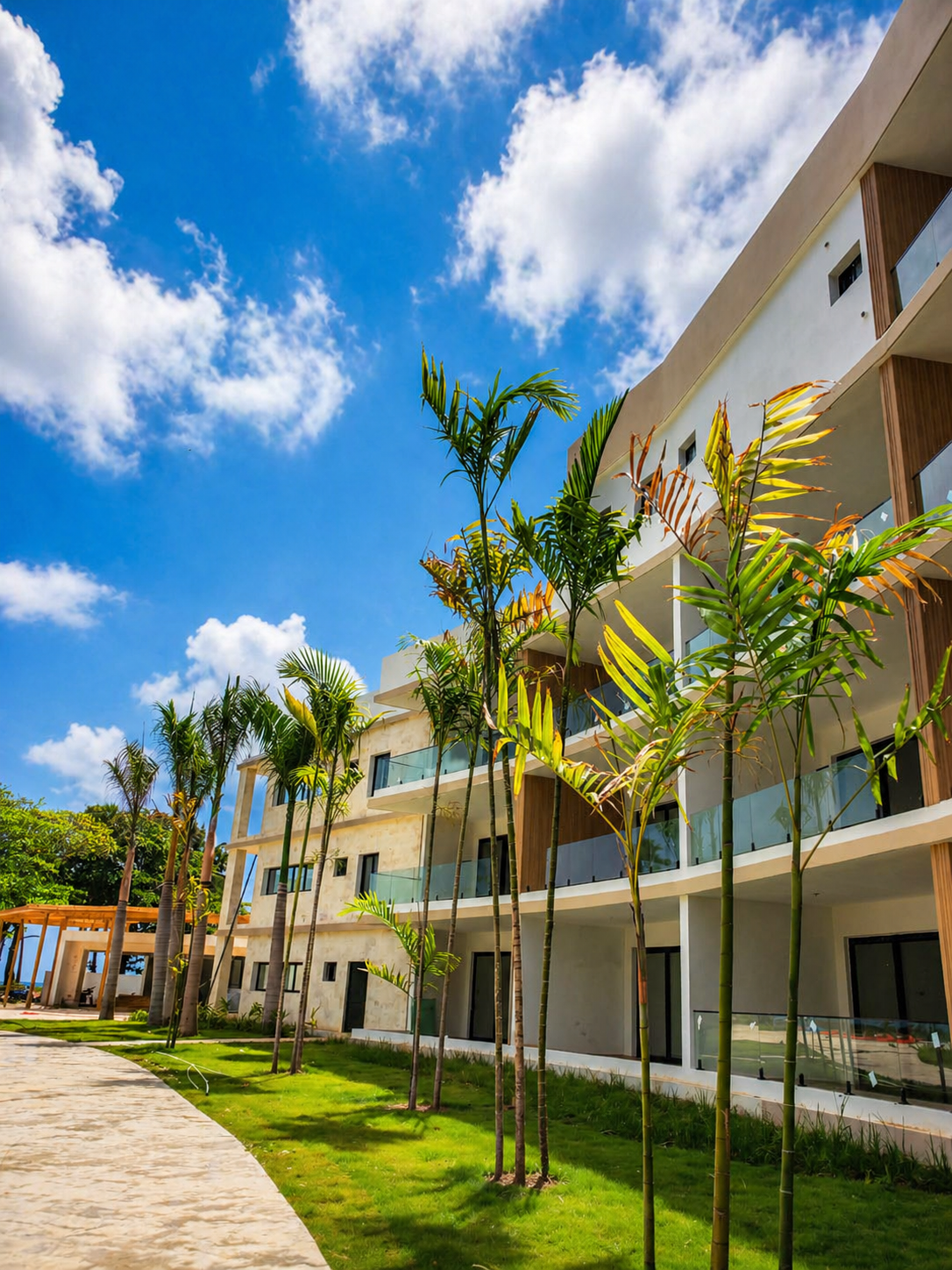 Resort-style tropical landscaping project with palm trees